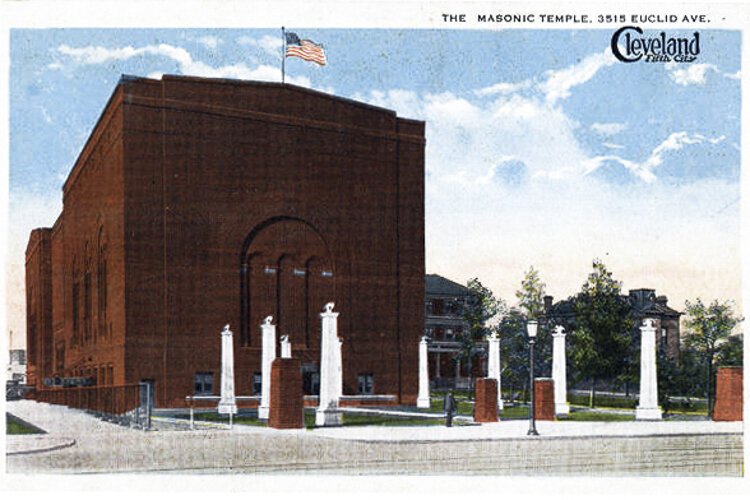 Exterior, ca. 1920s Although they were never built, this postcard shows a series of stone obelisks in front of the Masonic Temple, which were part of the original design.