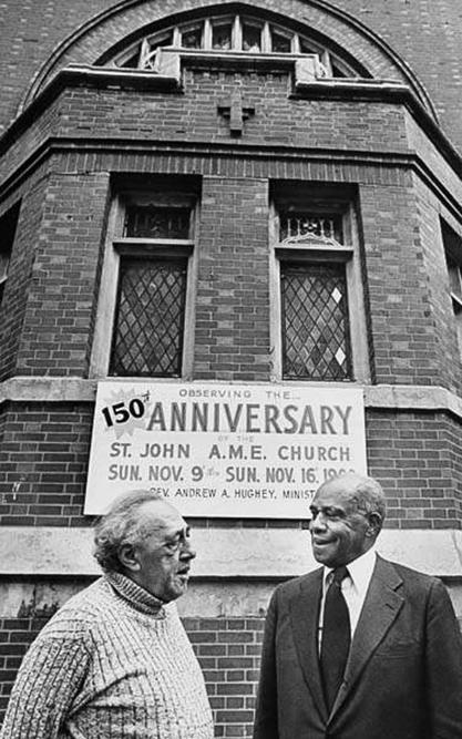 Pastor Andrew A. Hughey (right), ca 1980