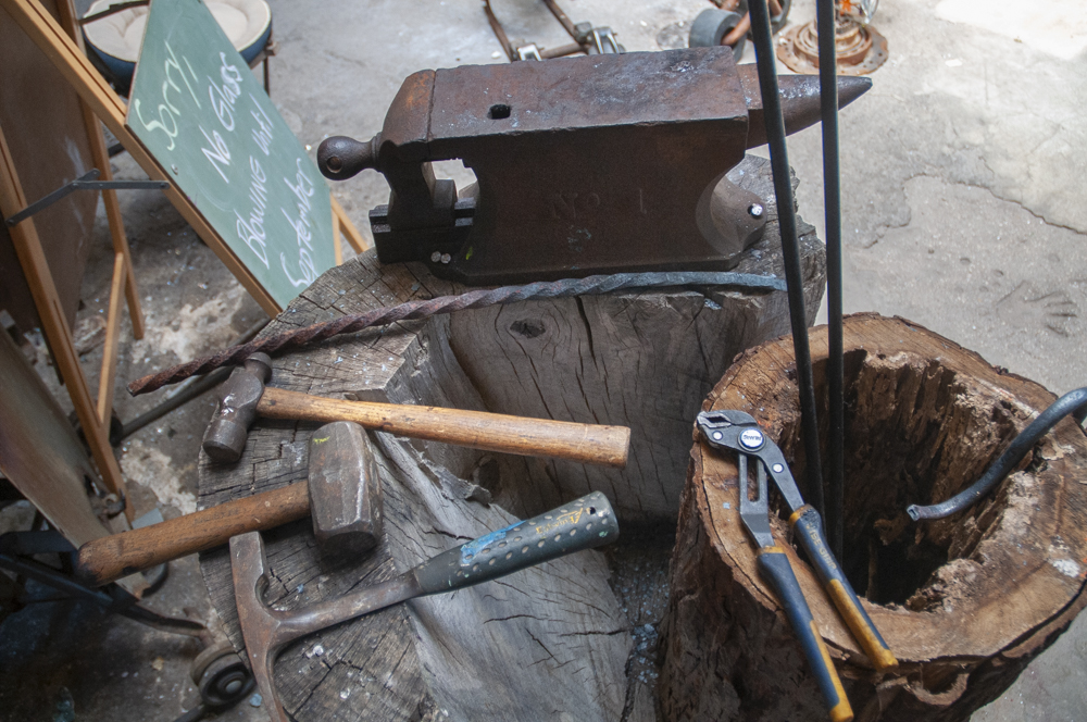The Glass Bubble has a metalworking shop on site, and Kaplan welds the metal he uses on his glass fixtures, as well as teaches metalworking classes