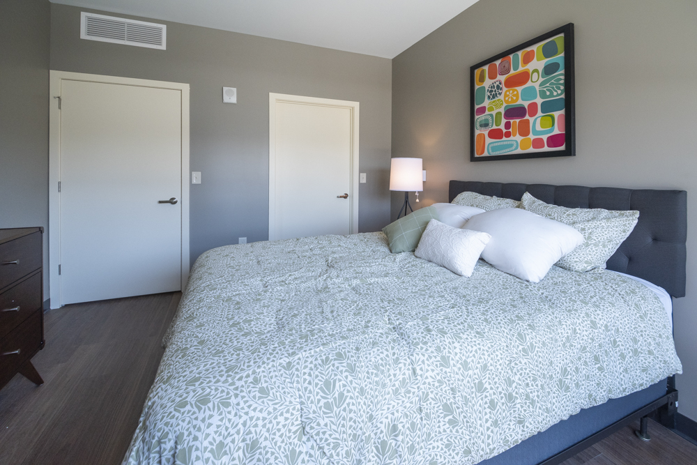 A bedroom in the new section of The Longfellow apartment complex