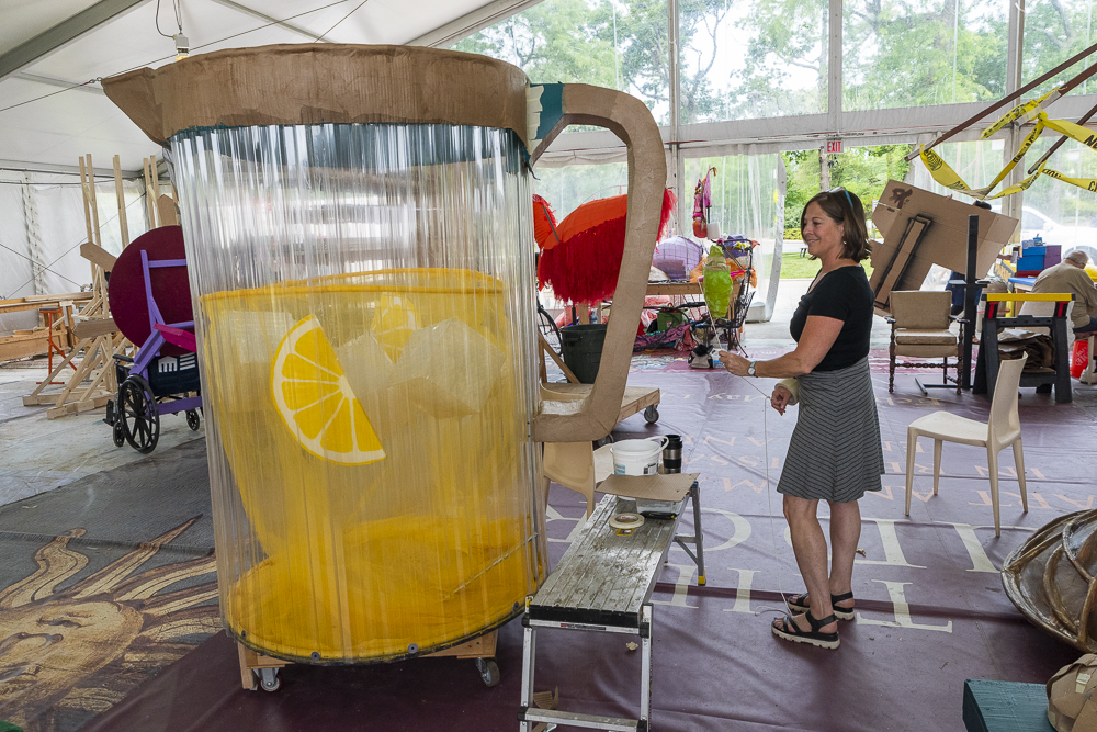 Stefanie Lima Taub, Director of Community Arts at CMA demonstrates the cool pitcher of lemonade piece for the Parade