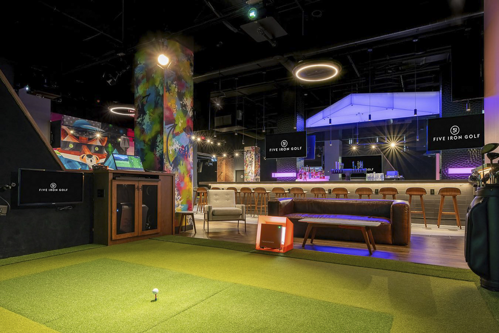 Five Iron Golf on the first floor of the Euclid Grand Apartments