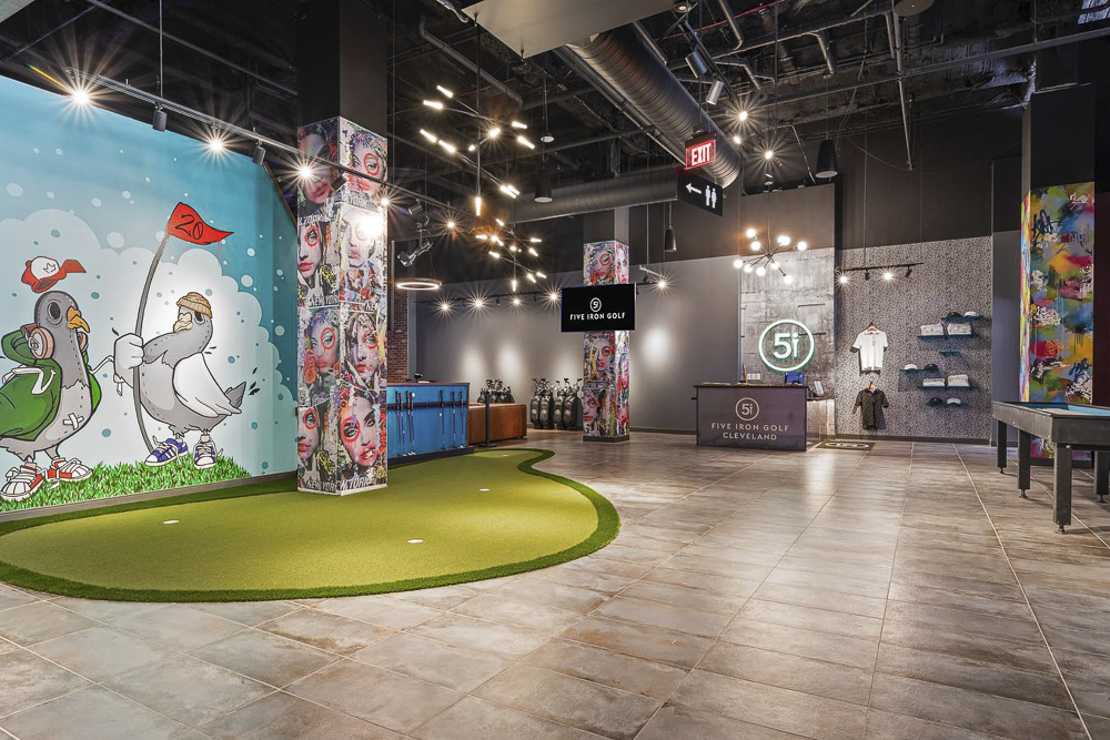 Five Iron Golf on the first floor of the Euclid Grand Apartments