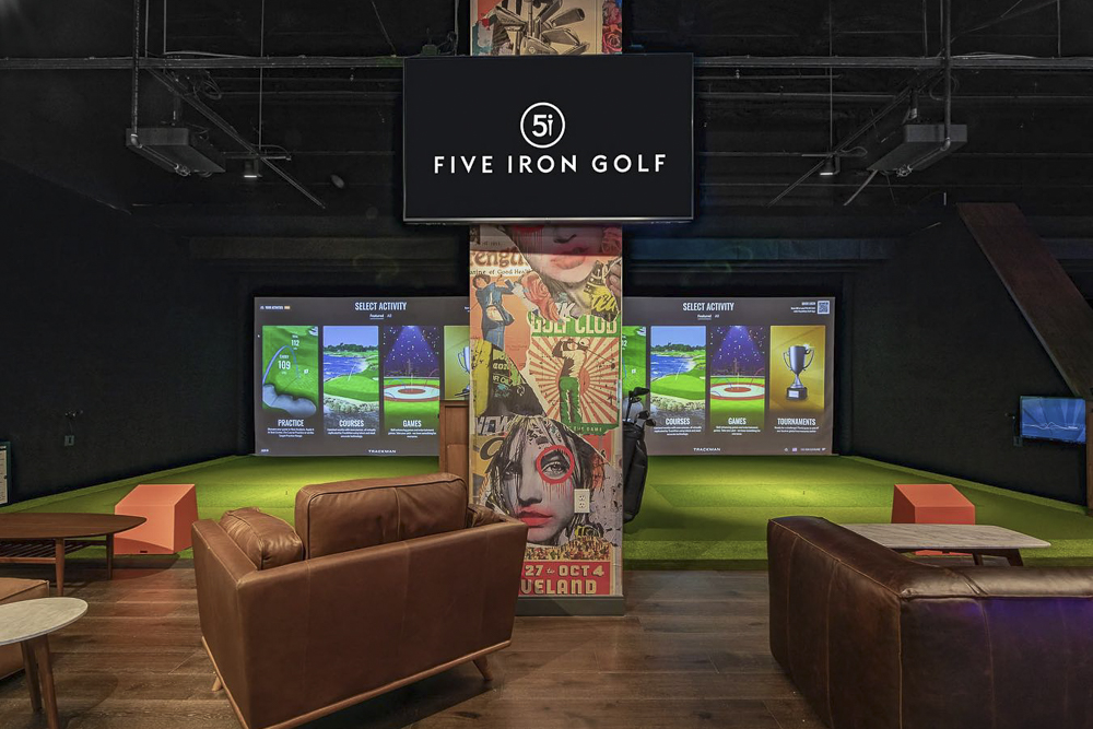 Five Iron Golf on the first floor of the Euclid Grand Apartments