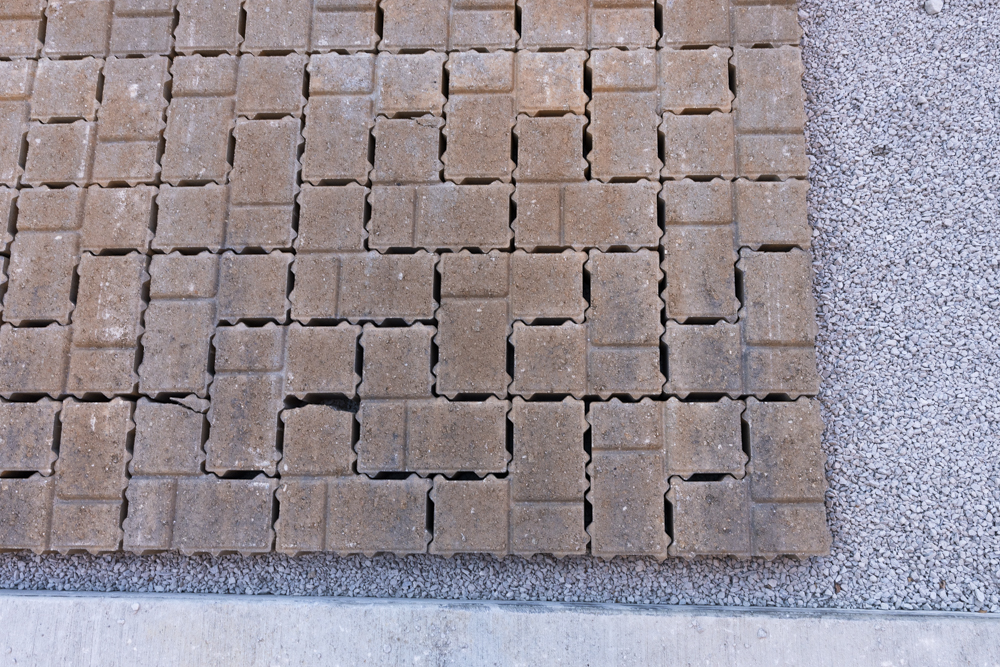Permeable pavers in a parking being laid down at St. Casimir Church
