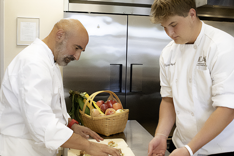 Chef Dante Boccuzzzi (left) at Paganini’s annual Cleveland’s Top Chefs last year