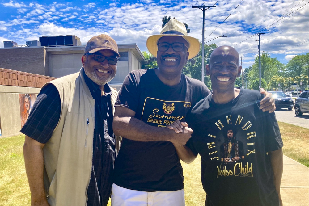 Jeremy Johnson, President and CEO, Assembly for the Arts, Ward 9 Council Member Kevin Conwell and guitarist Ismail Douglas happened to be walking by during Parade the Circle on June 9, the same day as the unveiling