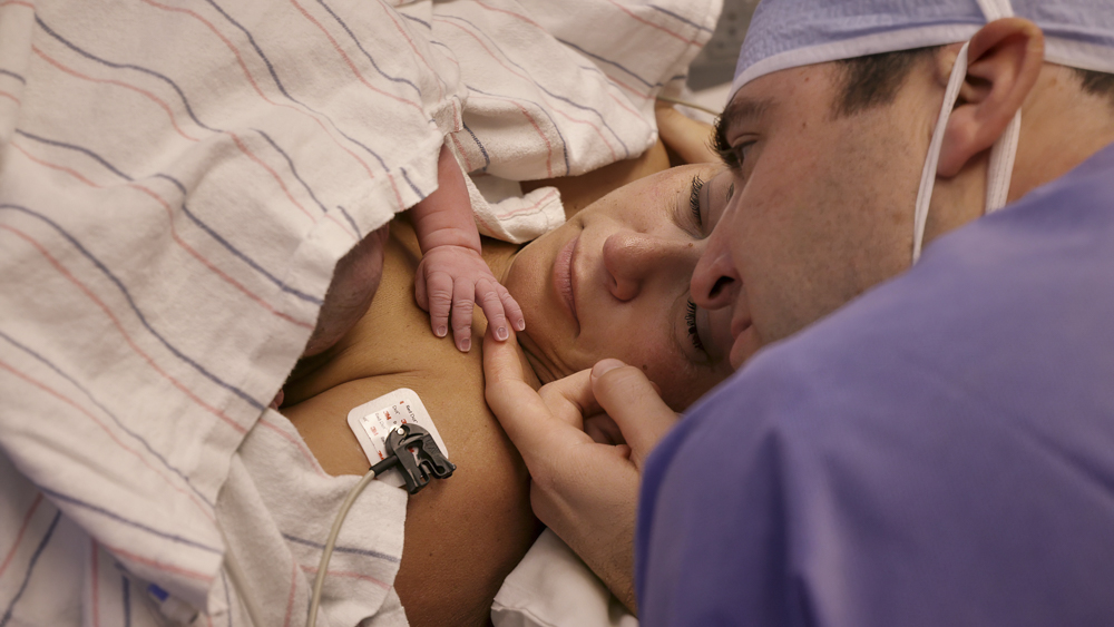 American Delivery still - Lindsey and Zach with baby
