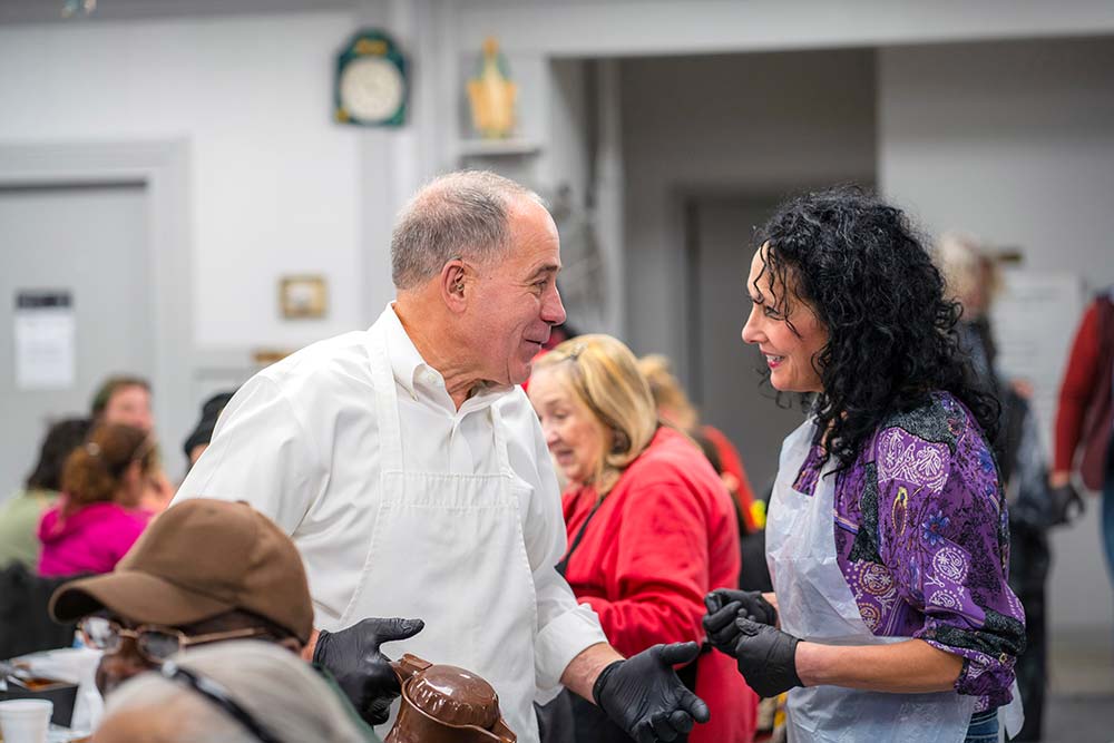 The St. Augustine Hunger Center of Catholic Charities hosts an annual Thanksgiving meal service with the assistance of hundreds of volunteers.