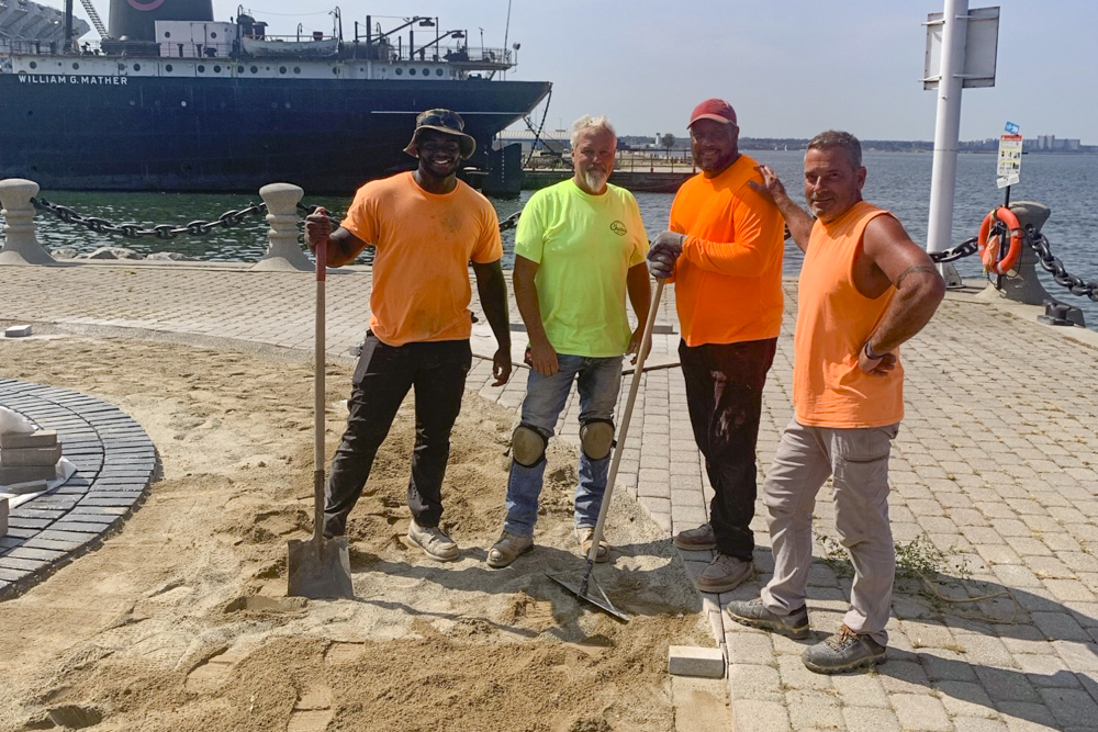 F. Buddie Contracting workers at the construction site of the Lone Sailor Plaza in Voinovich Bicentennial Park