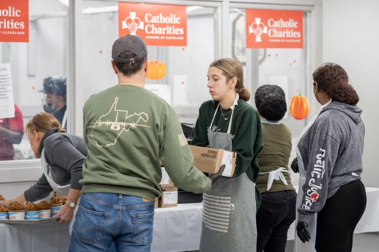 Volunteers packing up meals