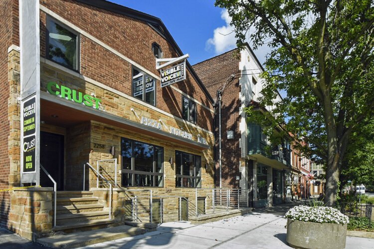 The storefront of Visible Voice Books