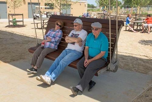 Swinging benches at Edgewater Park by artists Stephen Manka and Stephen Yusko