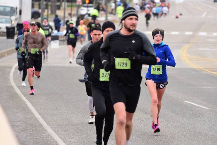 Blair Durda, right, placed first overall for women in the 5-mile race.