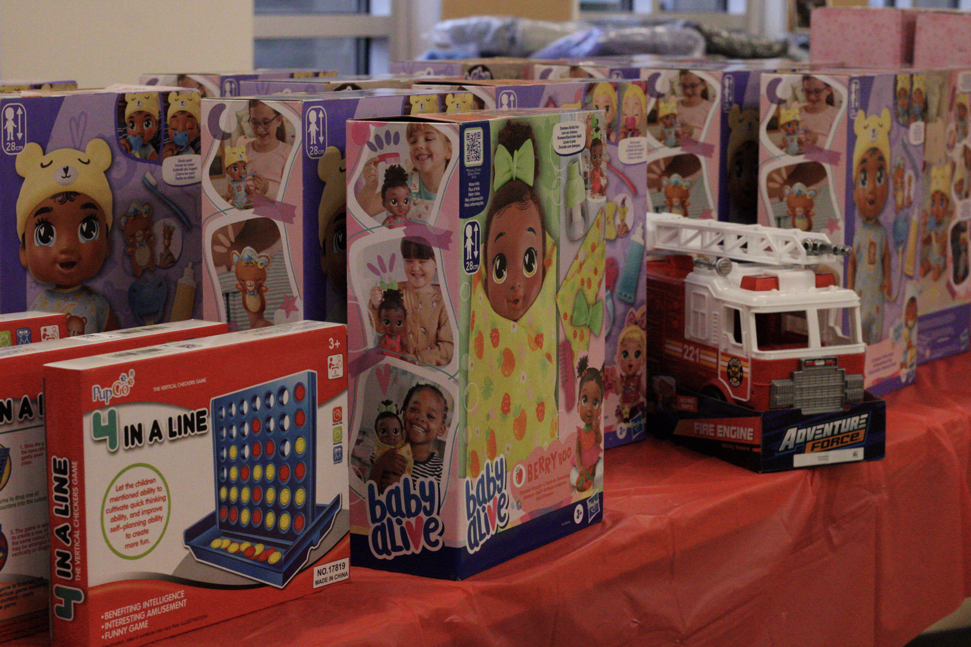 Rows of toys lined up and ready for families' picks.