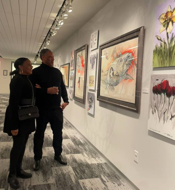 Anne and Greg say they were both impressed with the art of Derek Hess.