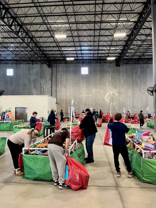 Volunteers sort more than 14,000 toys at The Salvation Army in Greater Cleveland Toy Workshop in Euclid.