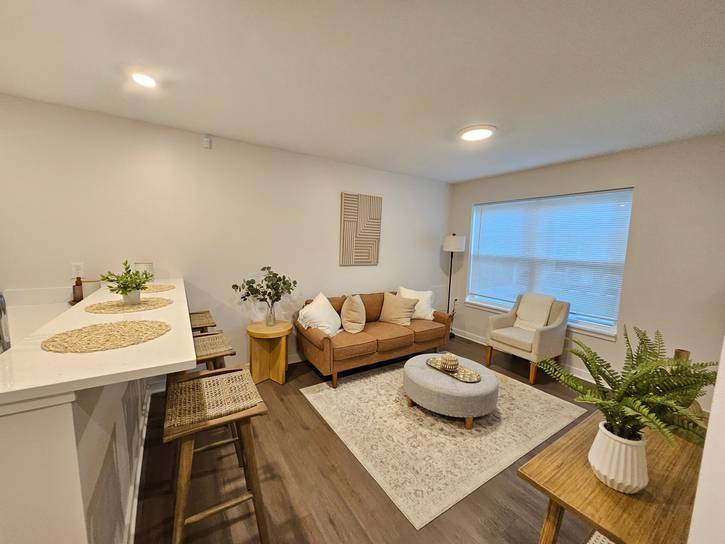 The living room and breakfast bar.