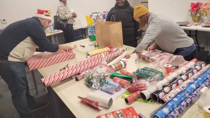 The giftwrapping station at the Towards Employment Alumni Holiday Bash and Gift Giveaway.