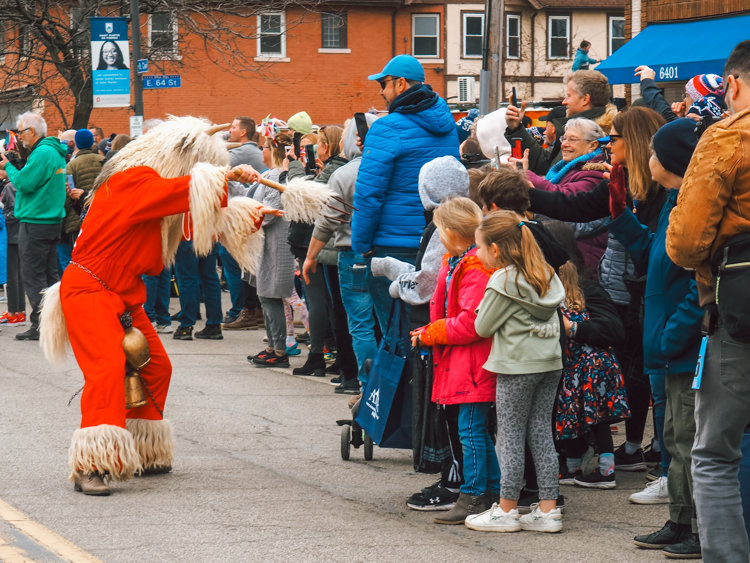 Kurenti engaging with festival attendees