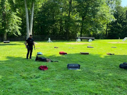Officer Jeremy Puszakowski, Chinook’s handler, doing a demonstration with Chinook.