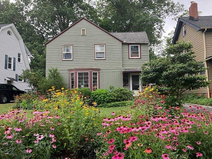 A rainbow of colors welcome guests to Meadowbrook Road.