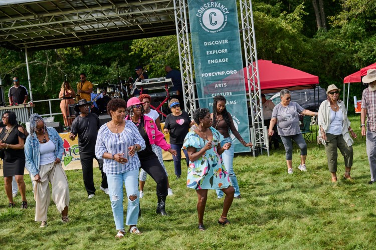 Line dancing at Rhythm on the River