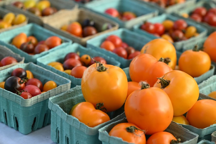 Vendors sell many tomato varieties each Saturday in the Summer.