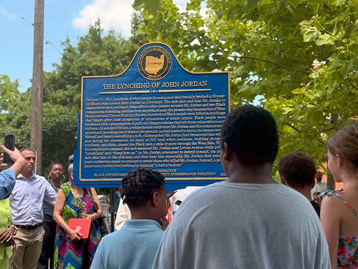 Guests at the Elizabeth Baptist Church dedication read the John Jordan marker