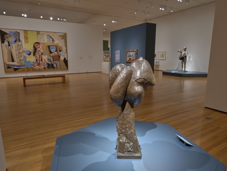 "Head of a Woman" in brass