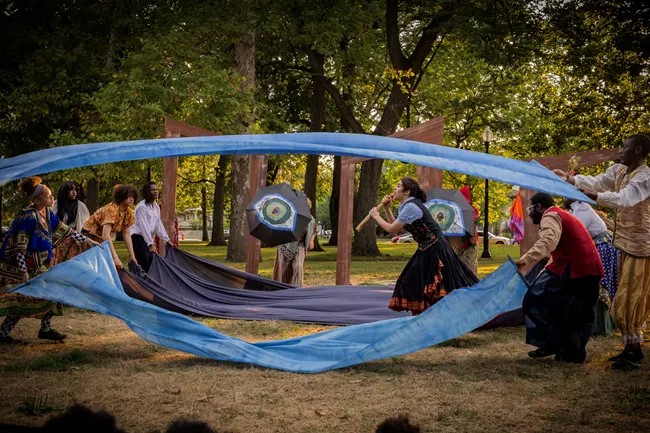 Youth in Cleveland Public Theatre’s Student Theatre Enrichment Program (STEP) depict a storm at sea during a performance of Carved.