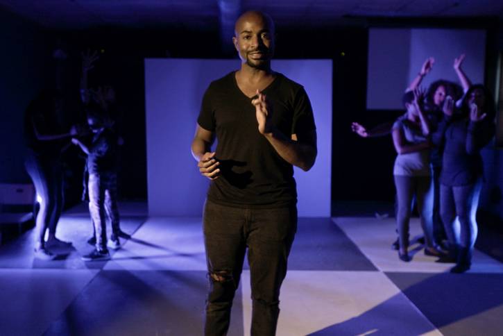 Nathan Tolliver and the ensemble in the 2017 revival of 'Objectively/Reasonable' .