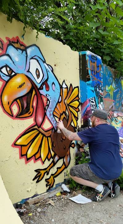 Bob Peck painting turkeys.