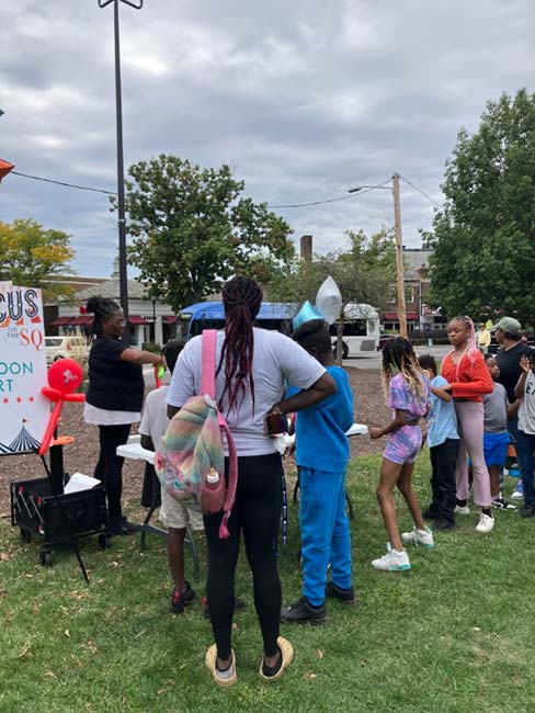 Sky Circus Cleveland members perform some balloon art.