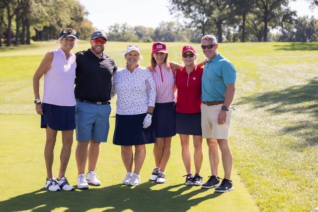 Golfers Britt DiSanto, Andrew Herbert, Diane Cambell, Christine Herrick, Sue McCormick, andChris Martin.