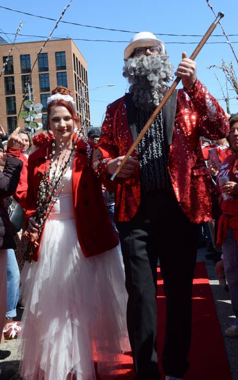 DJ Kishka walks bride Becki Locke down the aisle to James Sheehe, the waiting groom.