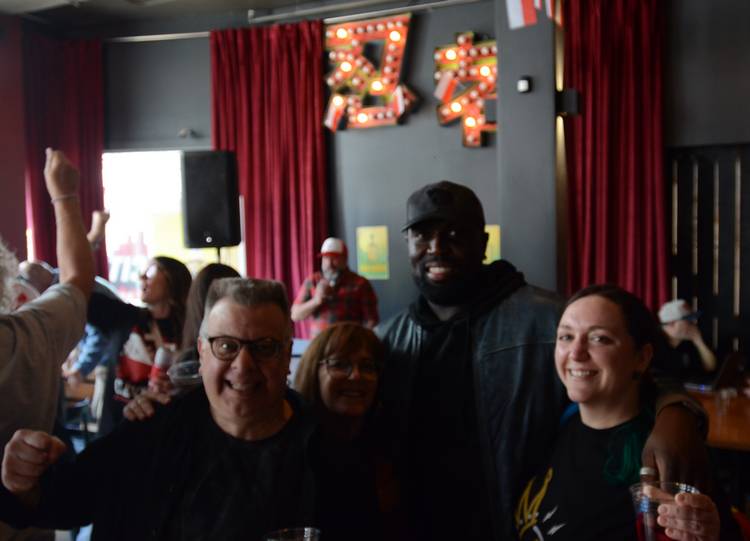 Marcus Hackney and friends celebrate at Ninja City Kitchen and Bar in Gordon Square.