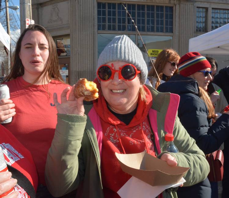 Enjoying a sesonal paczki .