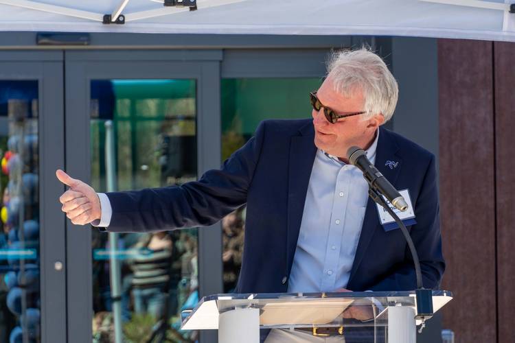 Cuyahoga County Executive Chris Ronayne speaks at the CCPL Parma ribbon cutting.