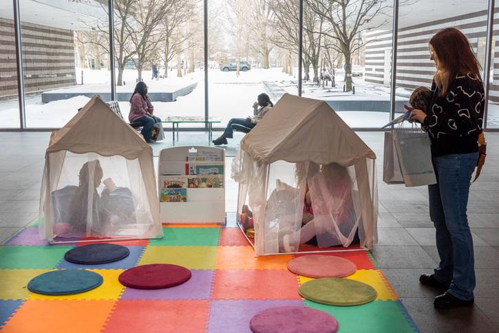 Remember Love Recovery Project making a mini flag to depict our history of protest, care for one another. and contemporary issues.