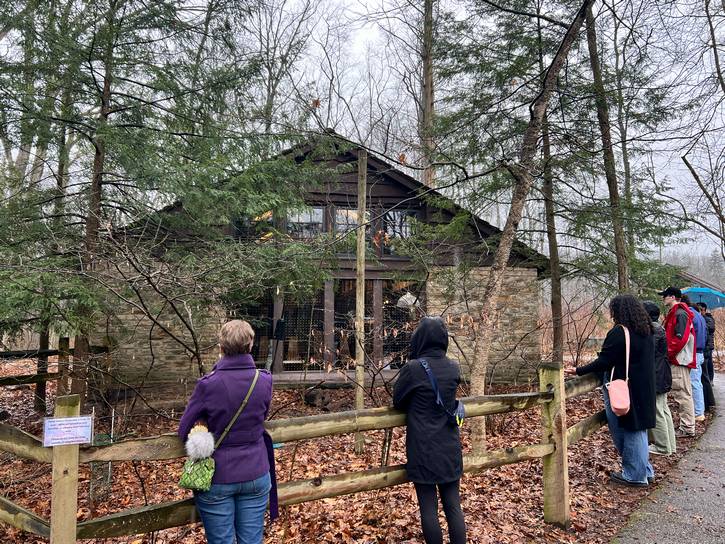 Attendees feed birds at the Brecksville Nature Center.
