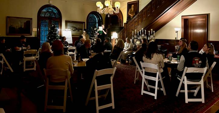 A group tries to solve the current murder mystery.