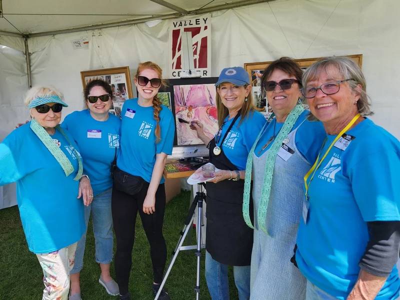 Volunteers at Art by the Falls.