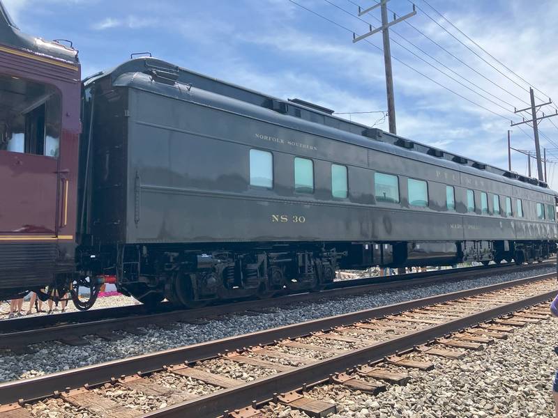 A restored Pullman car, a luxury passenger car, as it travels through Euclid.