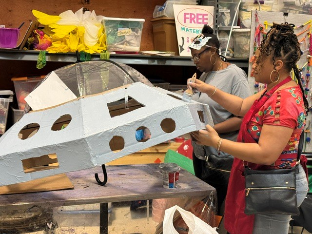 Some creators go 'space age' with their puppets and floats at the Community Arts Center.