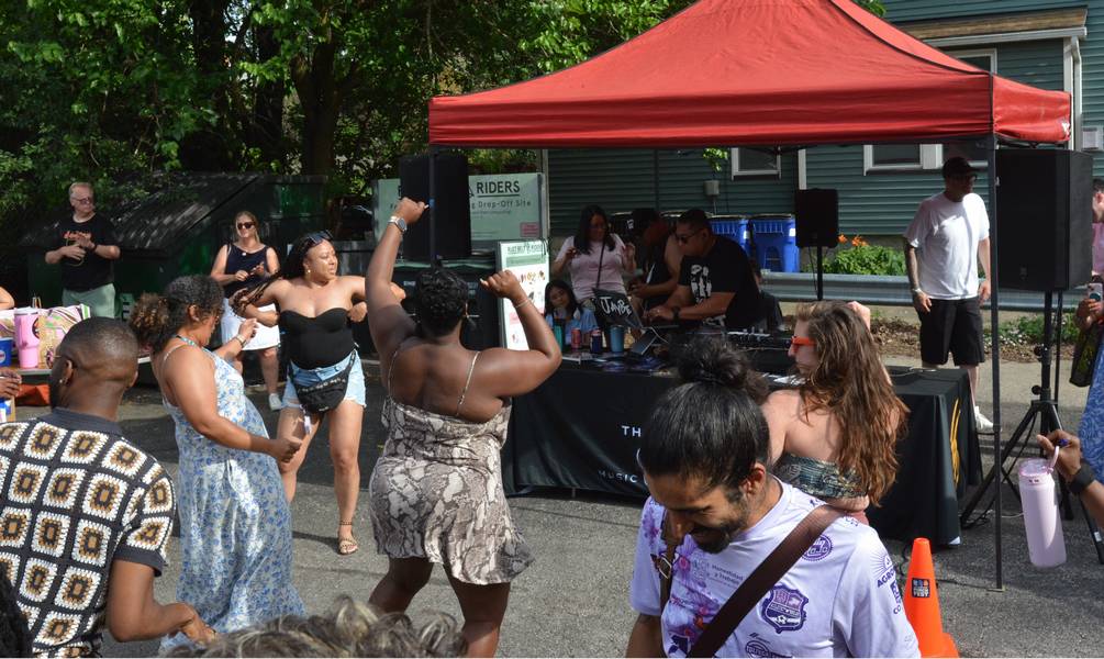 Dancing to the sounds of JayBe at Larchmere PorchFest.