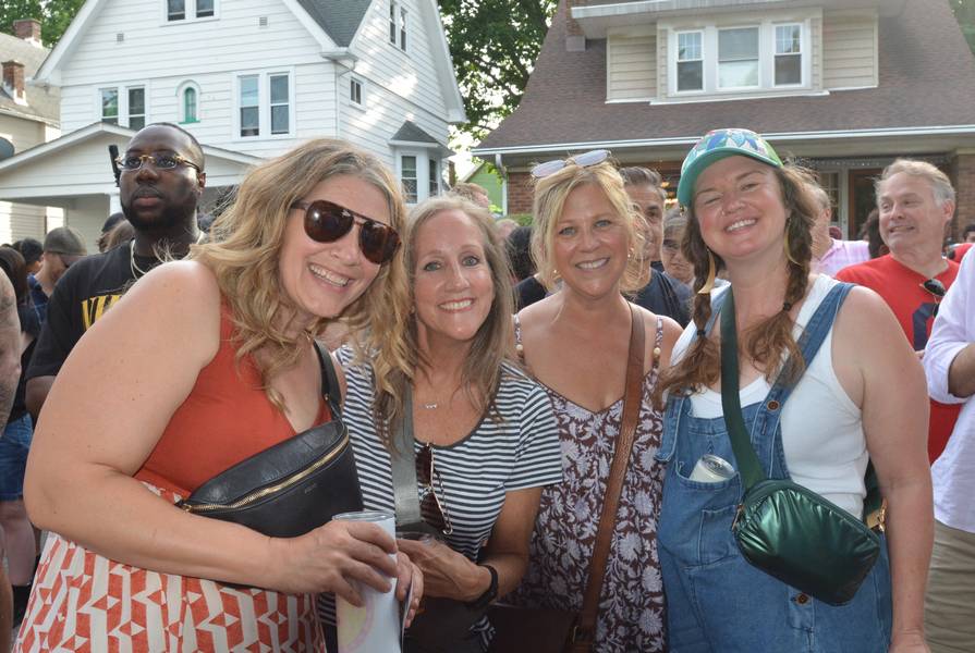 Christine Fader and friends enjoying her husband Jake perform with Hello3D.