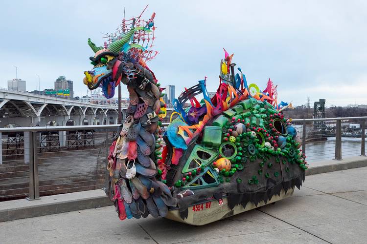 'Bessie' sculpture, created by Eddie 'Trash Fish' Olschansky and Ian Petroni, at the Towpath Trail Lantern Parade 2026.
