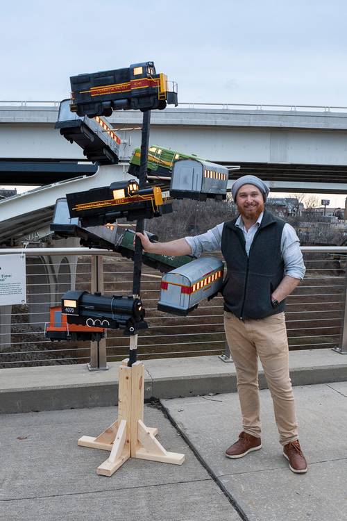 'Chugging Through Time: Trains of the Canal' lantern by artist Connor Riva at the Towpath Trail Lantern Parade 2026.