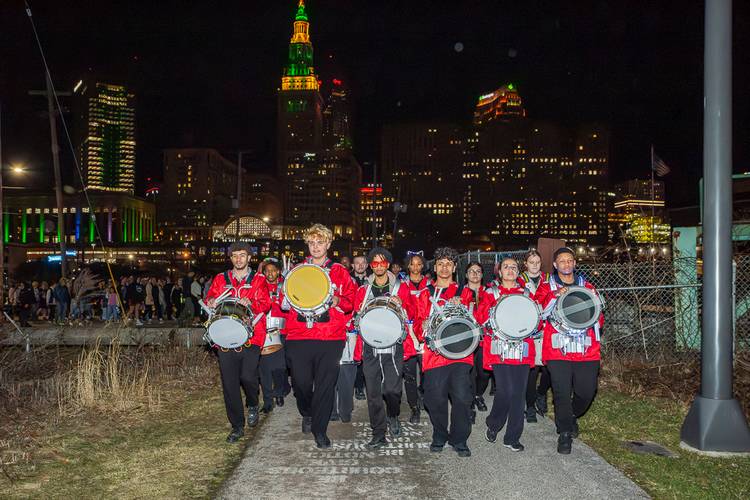 The John Marshall High School Drum Line performs during the Towpath Trail Lantern Parade 2026.